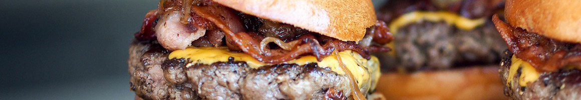 Eating Burger at Emma Jean's Holland Burger Cafe restaurant in Victorville, CA.
